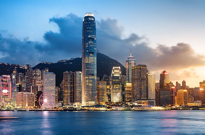Hong Kong financial services professionals discussing cross-sector reference checking compliance requirements.