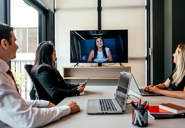 A company having a remote interview with a female candidate