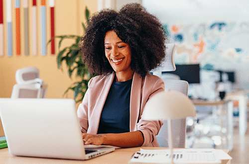 Female office lady working on her laptop