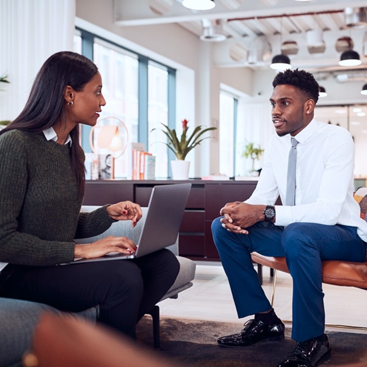 Professional discussion in a modern office setting