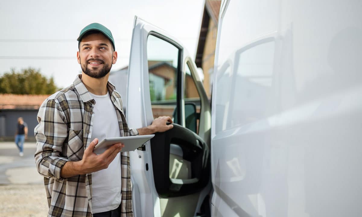 Fleet Driving getting in Work Van
