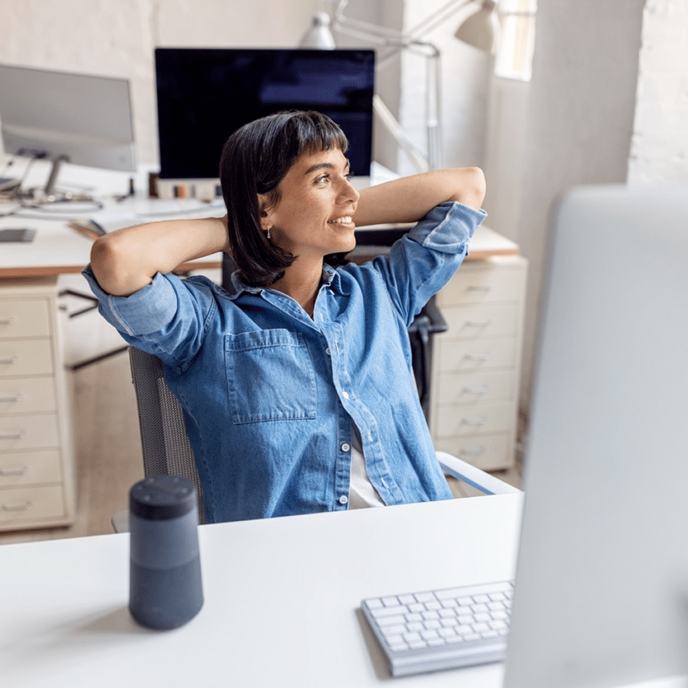 Person relaxing at office desk