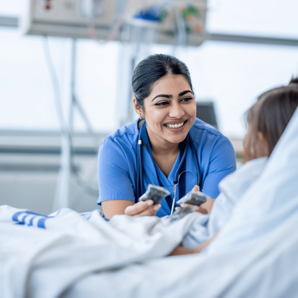 Healthcare professional speaking with patient